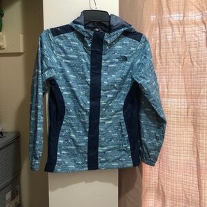 The North Face blue and navy waterproof jacket